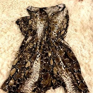 Snake print front zip up romper.